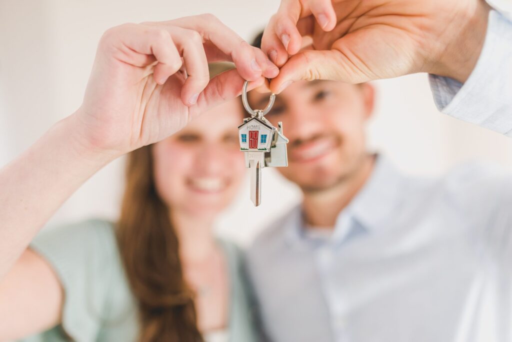 Home owners being given keys after Surveying People property survey