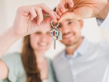 Home owners being given keys after Surveying People property survey